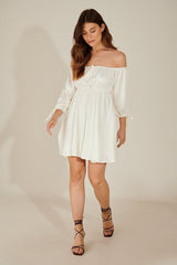 Chic White Fit and Flare Dress with Solid Three-Quarter Sleeves