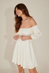 Chic White Fit and Flare Dress with Solid Three-Quarter Sleeves