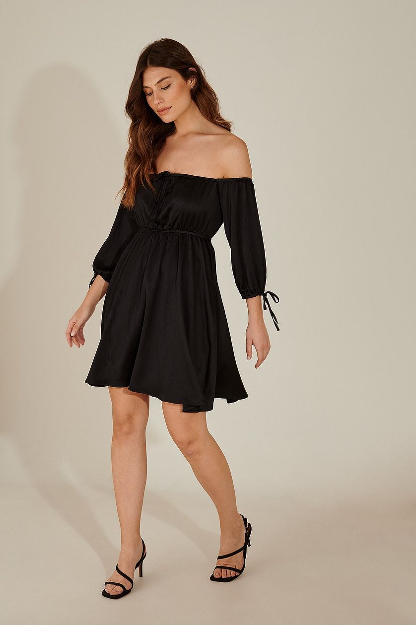 Stylish Black Fit and Flare Dress with Solid Three-Quarter Sleeves