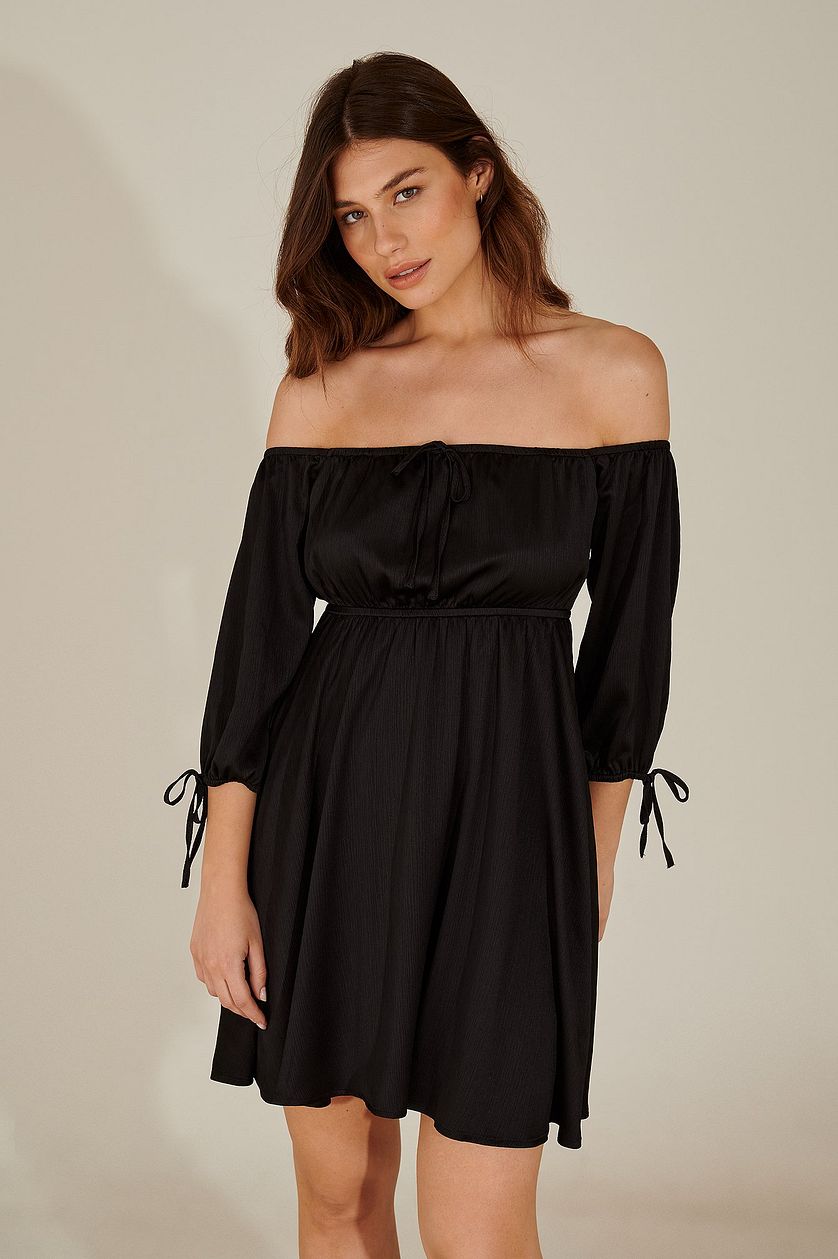 Stylish Black Fit and Flare Dress with Solid Three-Quarter Sleeves