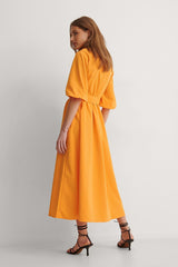 Stylish Orange Rayon Maxi Dress with Solid Balloon Sleeves for Any Occasion