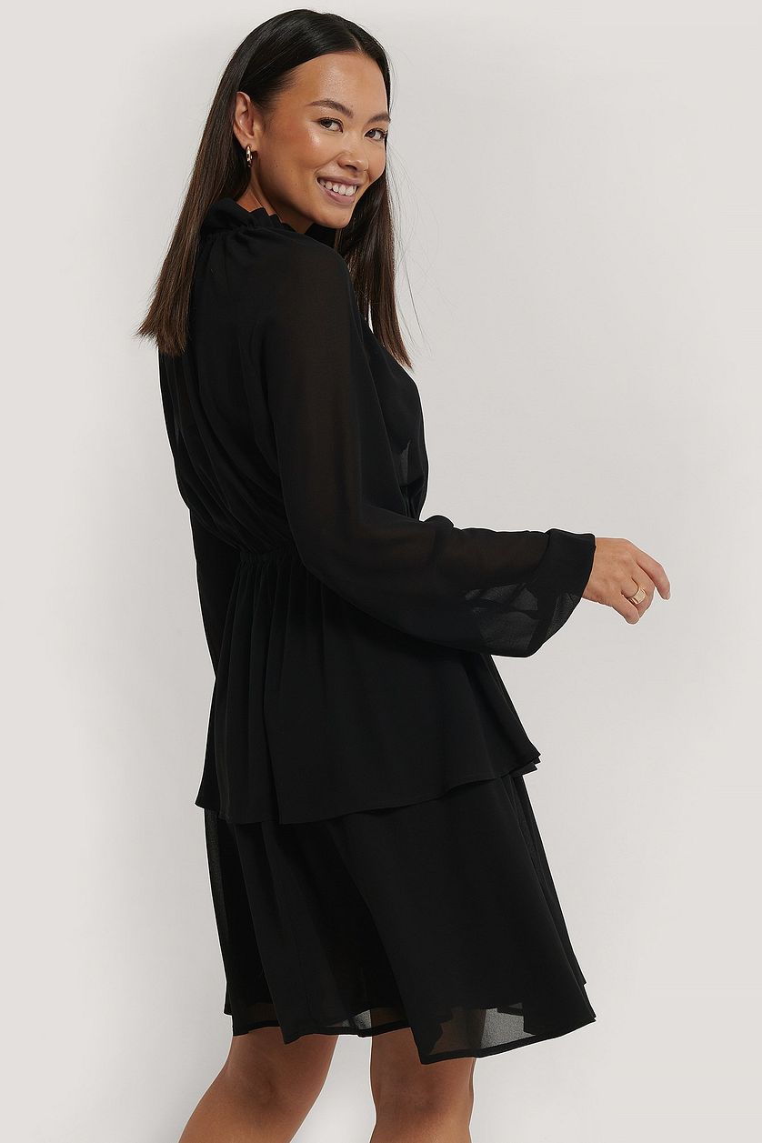 Chic Black Georgette Dress with Balloon Sleeves & Sheer Cut Out Design