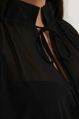 Chic Black Georgette Dress with Balloon Sleeves & Sheer Cut Out Design