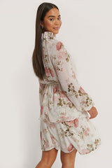 Elegant White Chiffon Fit and Flare Dress with Long Sleeves and Floral Print