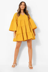 Stylish Mustard Rayon V Neck Dress with Bell Sleeves - Tiered Solid Design