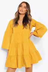 Stylish Mustard Rayon V Neck Dress with Bell Sleeves - Tiered Solid Design