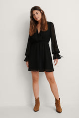 Chic Black Georgette V Neck Dress with Balloon Sleeves - Solid Wrap Style