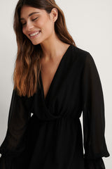 Chic Black Georgette V Neck Dress with Balloon Sleeves - Solid Wrap Style