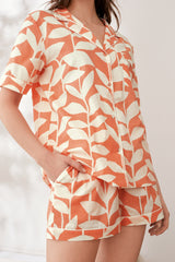 Styleinstant Orange Leaves Printed Lounge Wear.