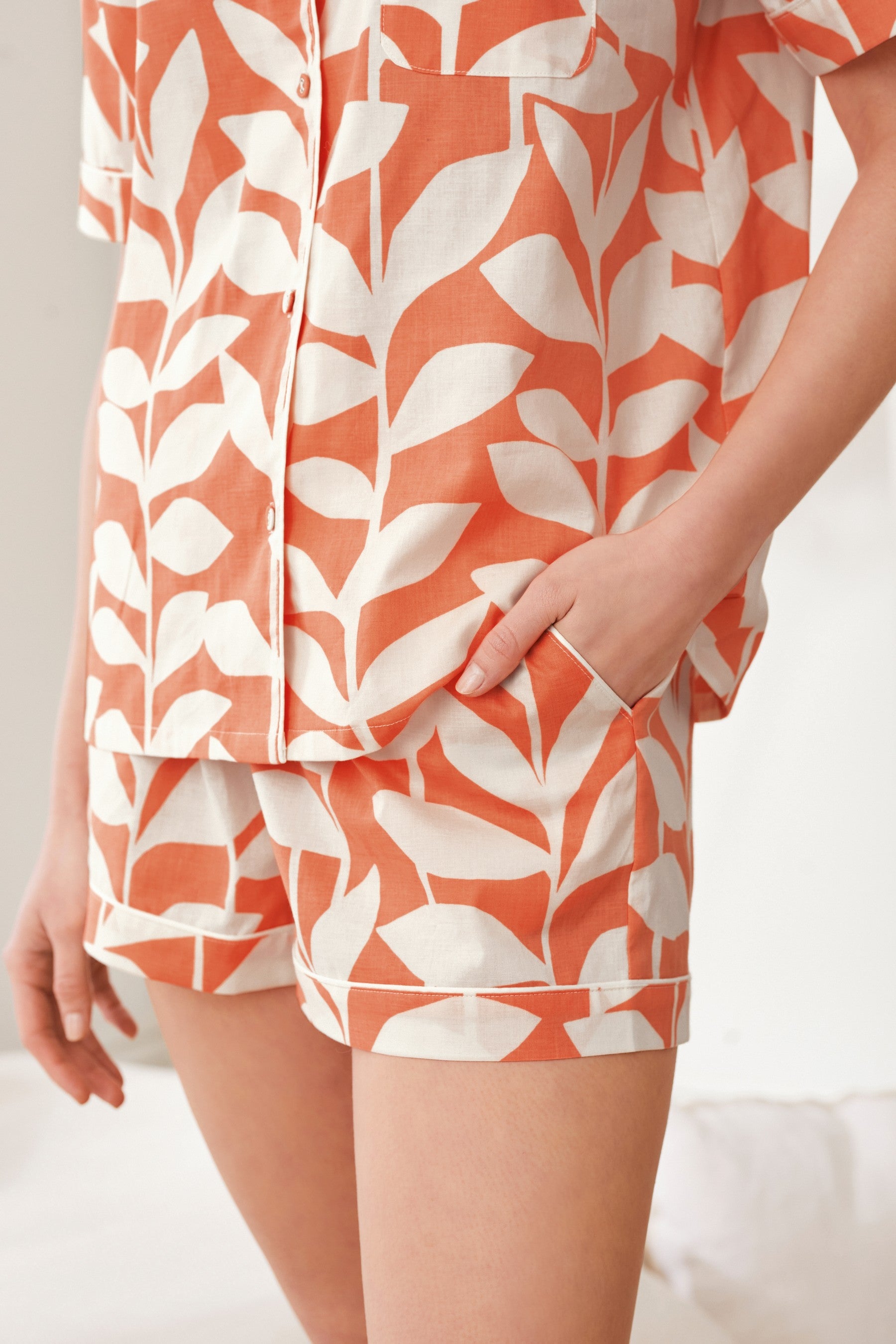 Styleinstant Orange Leaves Printed Lounge Wear.