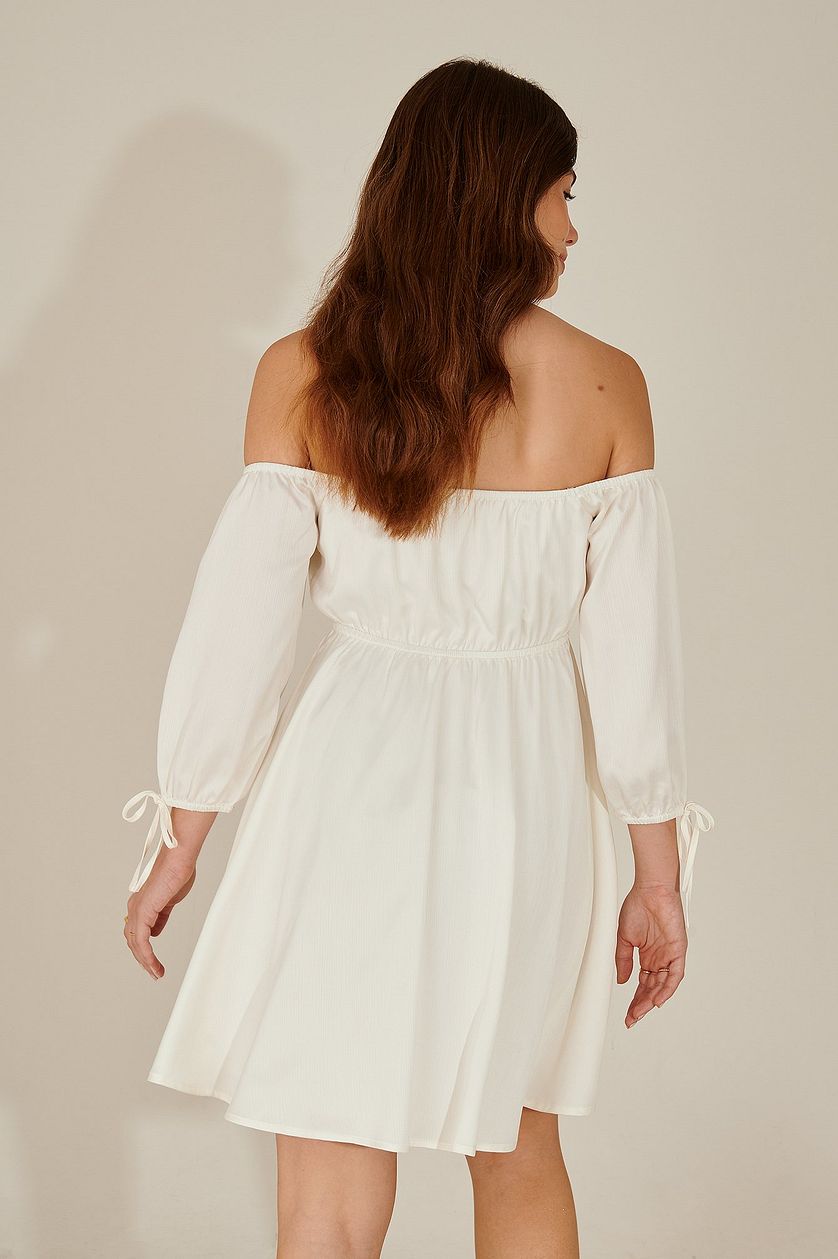 White pamela off shoulder recycled mini dress